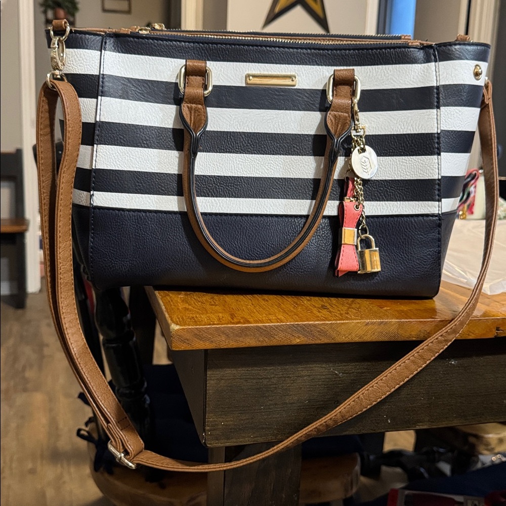 Call it Spring striped shoulder purse. Lightly used - next to no signs of wear
